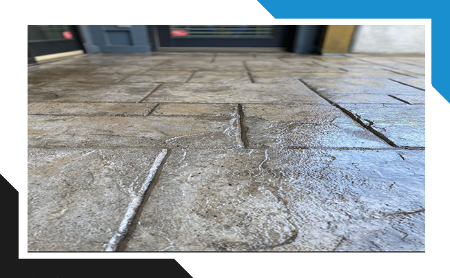 Garage floor sealed to protect against oil, salt, and moisture